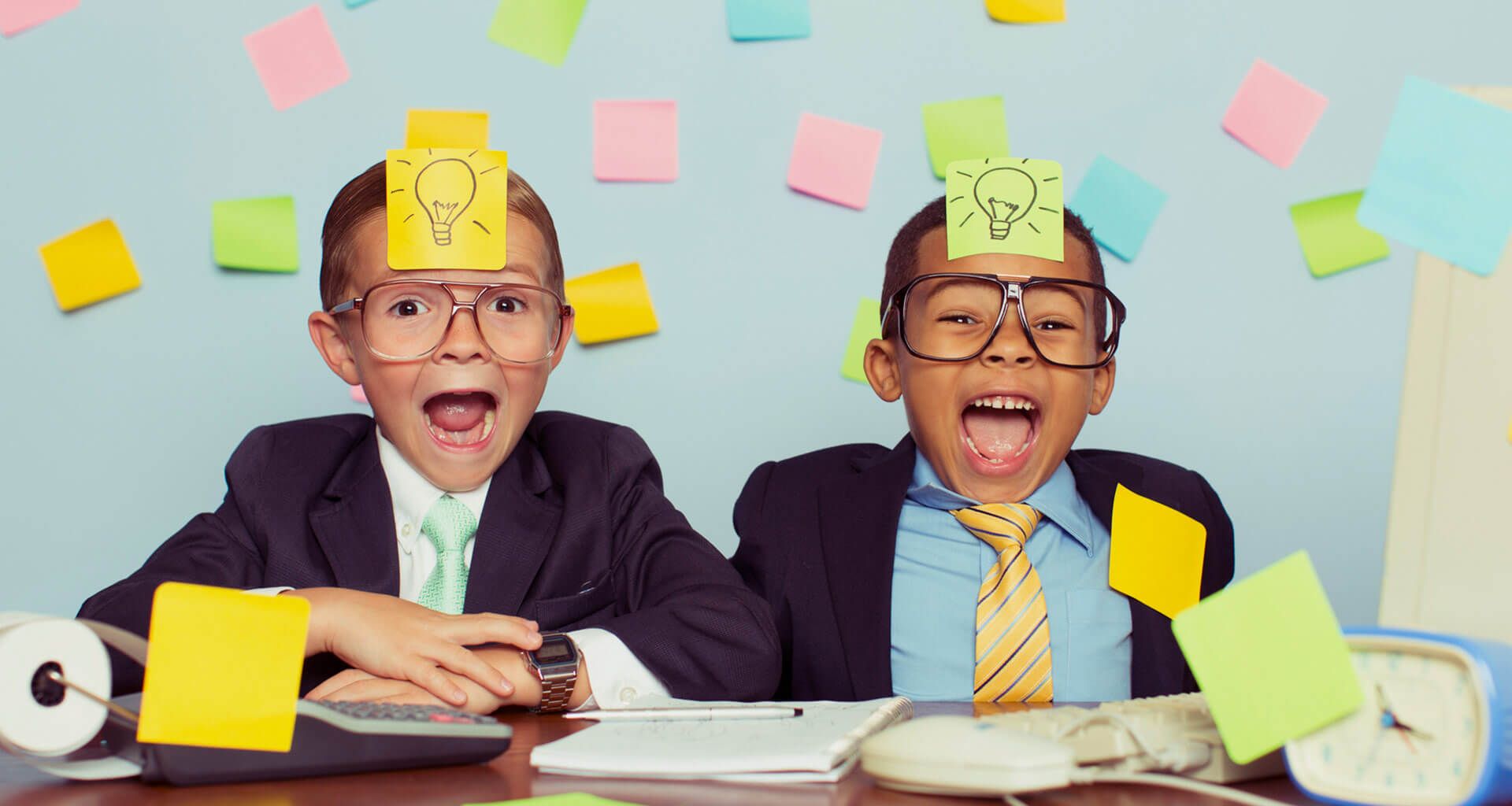 two kids having fun in business